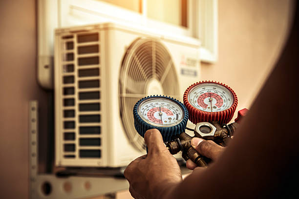 Professional Air Conditioning Service technician working in Orchard Hill, GA